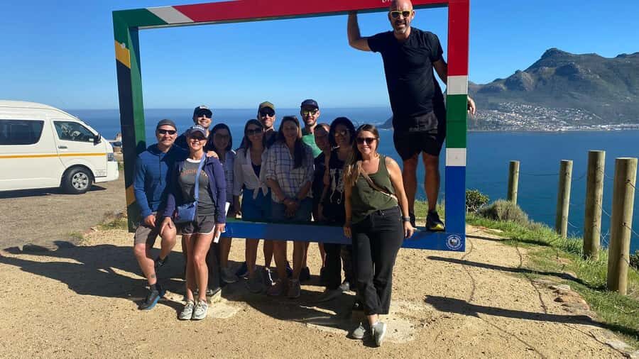 Cape Town: Cape of Good Hope, Seals and Penguins Day Tour - Muizenberg beach huts and Bo Kaap Malay Quarter: end with color