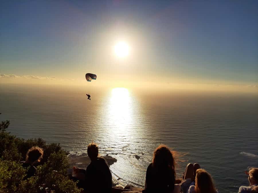 Cape Town: Lion's Head Sunrise with coffee or Sunset Hike - Ladders, Chains, and Rock Pitches: Reaching the 669 m Summit