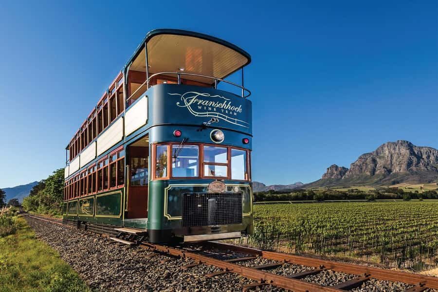 From Cape Town: Franschhoek Wine Tram Hop-on Hop-off - From Cape Town to the Winelands: the comfy ride that starts the day right