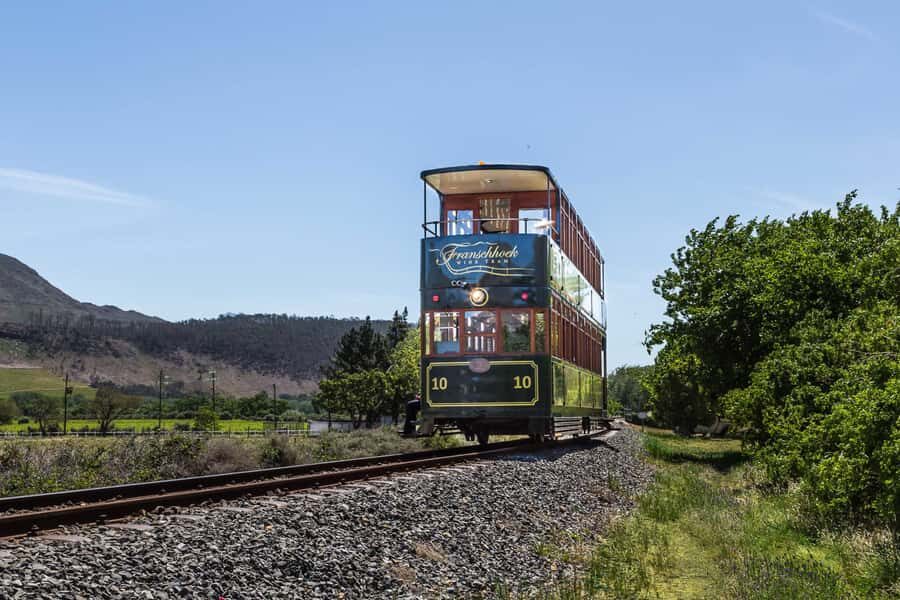 From Cape Town: Franschhoek Wine Tram Hop-on Hop-off - The stories behind the wine: live commentary that makes stops make sense