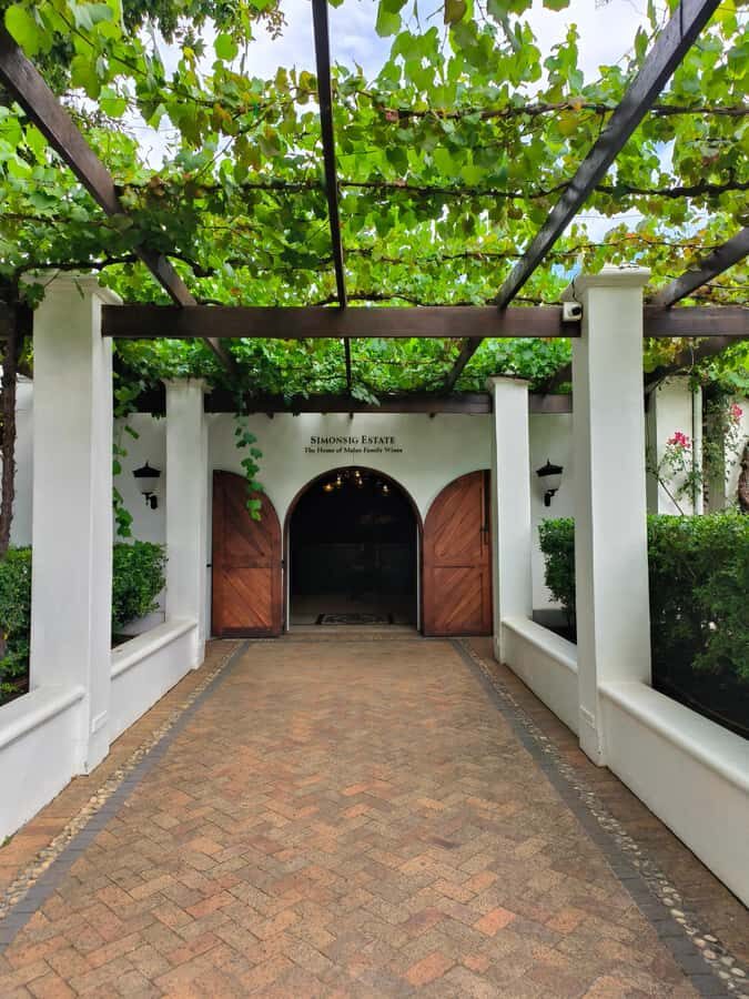 From Cape Town: Stellenbosch Four Estate Full-Day Wine Tour - Stellenbosch Town on the Drive: Cape Dutch Charm Without the Stress