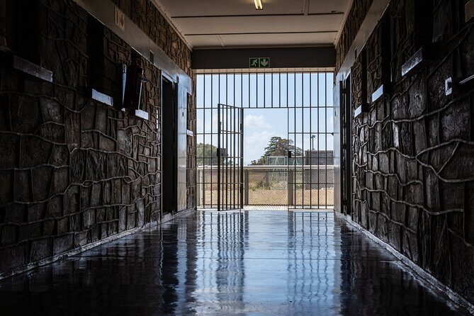 Robben Island Tour including Pick Up & Drop Off from Cape Town - Robben Island Museum and the First Walk: You Start Seeing the Prison Before You Enter It