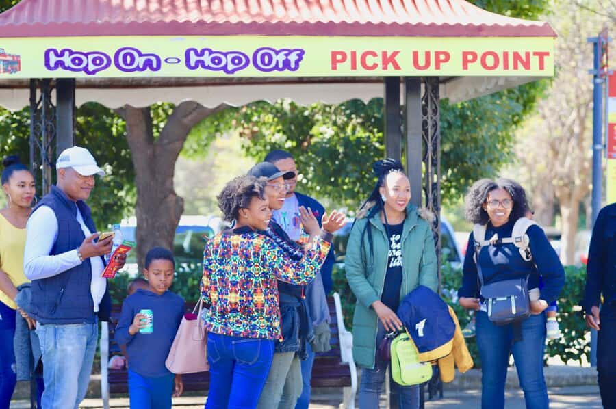 Soweto: Hop-On Hop-Off Bus, City Tour and Apartheid Museum - Food-and-friends moment: Chaf Pozi and shisa nyama vibes